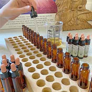 Hand pouring Bach Flower Remedies