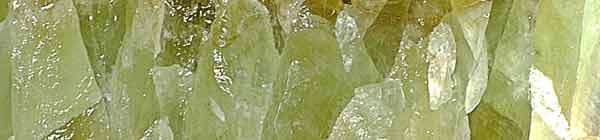 Green Calcite crystal close up showing colour and striations