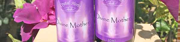 Divine Mother Essence bottles with flowers