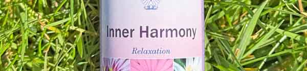 The Inner Harmony Essence A bottle of Inner Harmony Essence lying grass