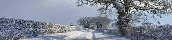 Winter Scene of snow in a quiet country lane in Norfolk