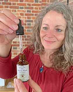 Jackie taking some Cherry Plum Bach Flower Remedy