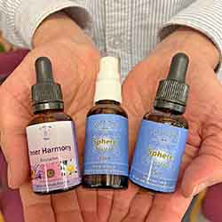 Three bottles of Essences in hands