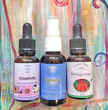 Creativity Flower Essences - three bottles on an artwork background