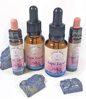 Four bottles of Crystal Herbs Lapis Lazuli crystal essence with pieces of Lapis Lazuli crystal