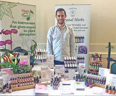 Sam with the Crystal Herbs Stand at Plant Consciousness 2017 Sam Cremnitz with the Crystal Herbs Stand at Plant Consciousness 2017