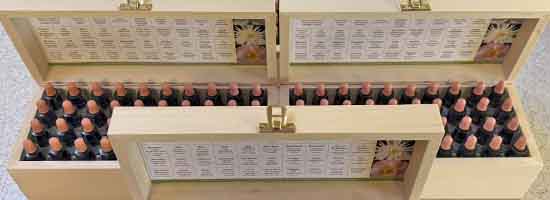 Our Bach Flower Remedy sets in a wooden box Three Bach Flower Remedy sets in wooden boxes with their lids open