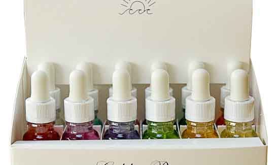 A 15ml Rainbow Light Body Essence set open and displaying the twelve bottles