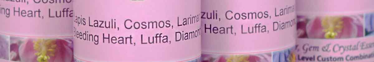 Bottles of personal flower & crystal essence combinations - close up of label with essence listing